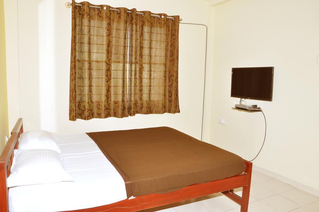 Vega Residency Hotel Бангалор Стая снимка